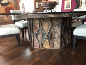 A Paul Evans metal furniture for sale in a showroom.